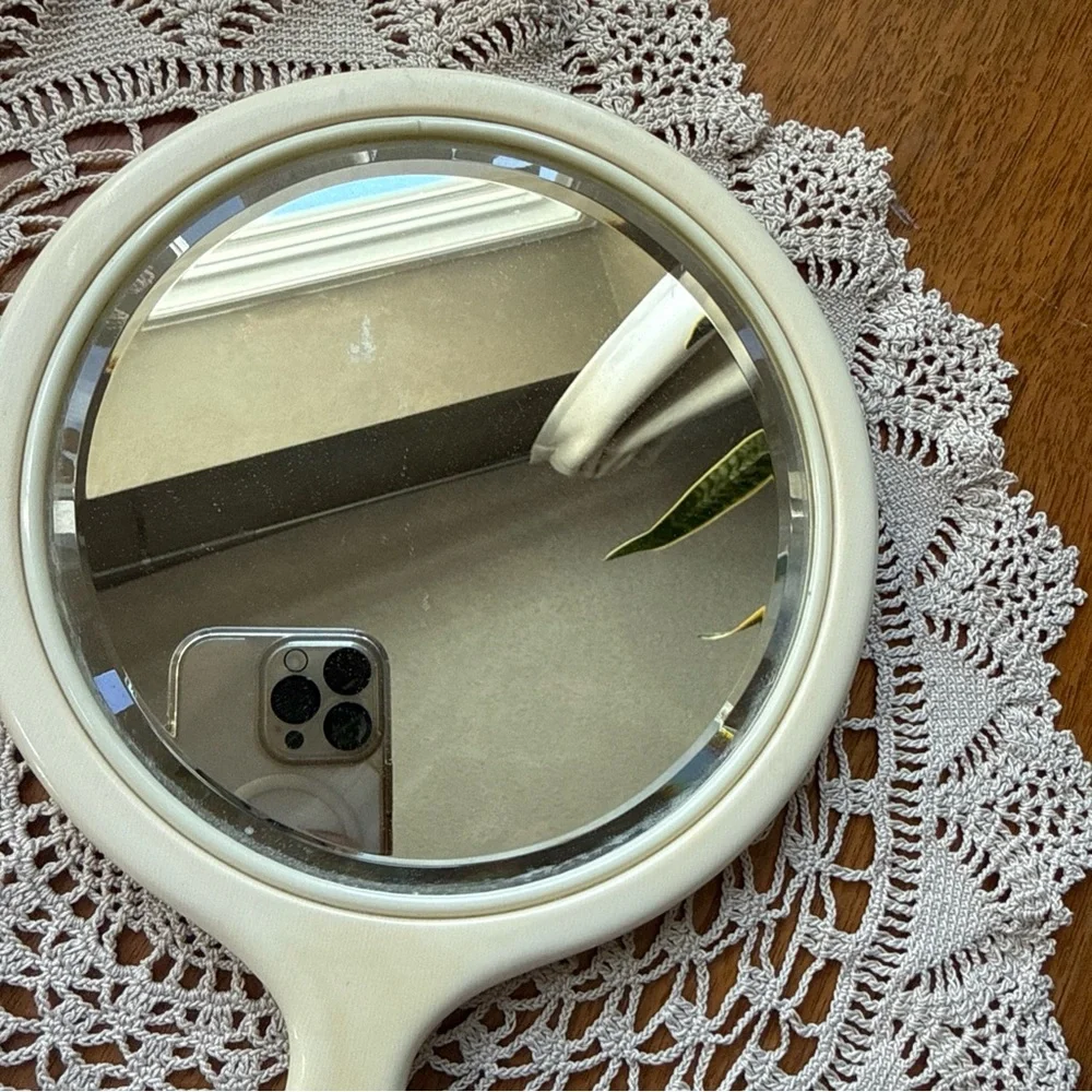 Vintage Art Deco Vanity Hand Mirror Bakelite Celluloid? Fairly heavy for mirror